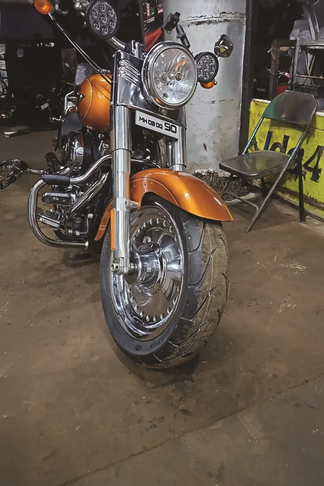 real-fitted-scorcher11-1 Michelin Scorcher 11 front tyre installed on an orange cruiser motorcycle