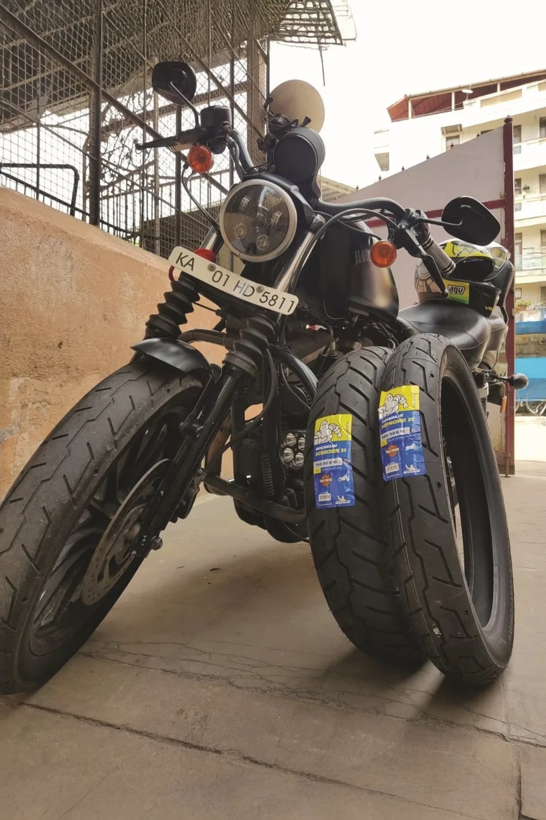 real-fitted-scorcher31-4 Black cruiser motorcycle fitted with Michelin Scorcher 31 motorcycle tyres indoors