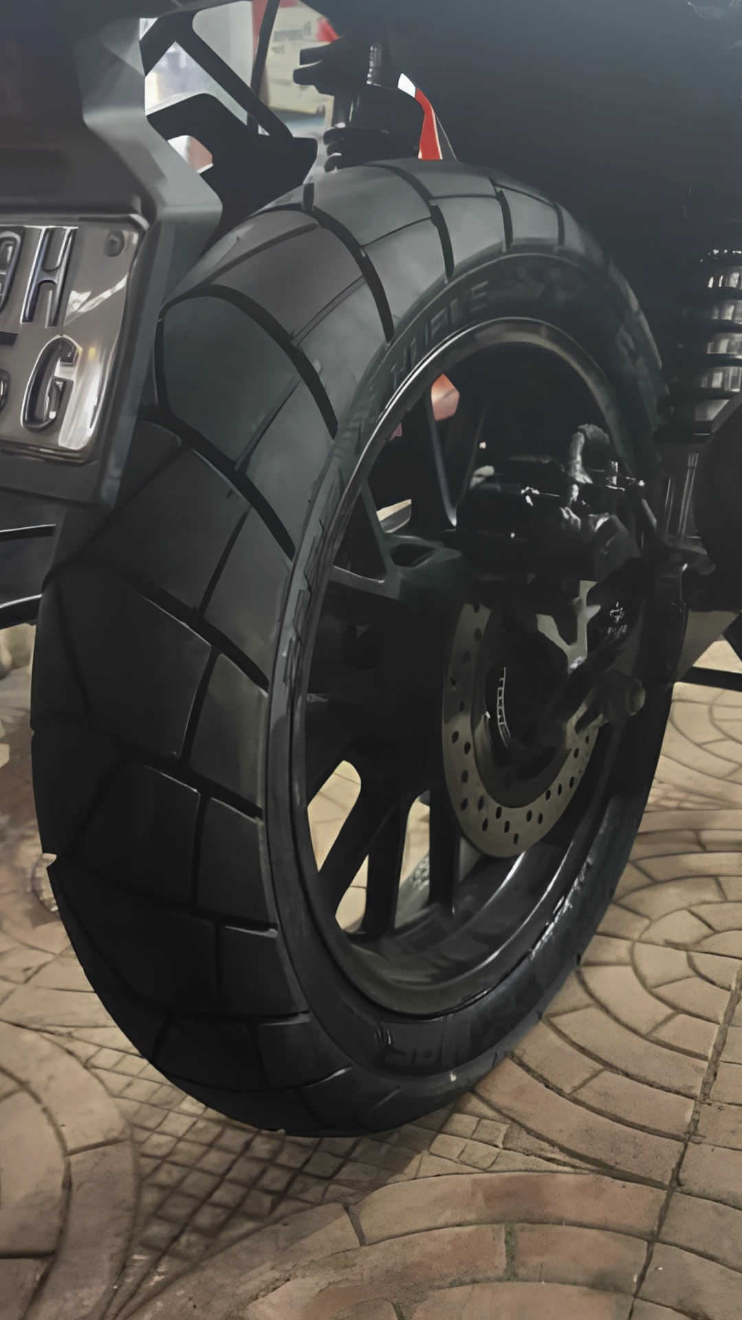 MRF Zapper Kurve Rear Tyre Fitted on Motorcycle MRF Zapper Kurve tyre fitted on motorcycle rear wheel side view